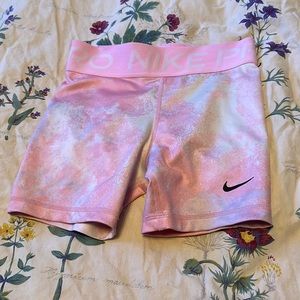 Girls size medium pink Nike pros.